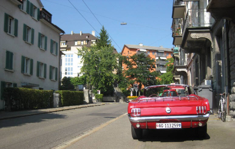 FORD MUSTANG 1965 CABRIOLET ROT ZRICH SCHWEIZ. RED FORD MUSTANG 1965  CONVERTIBLE WITH RED INTERIOR IN ZURICH SWITZERLAND. AMERIKANERAUTOS. OLDTIMER 60s muscle cars classics
